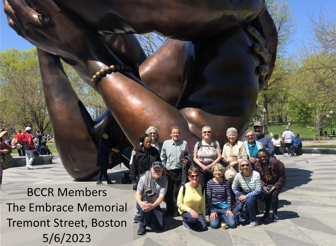 BCCR members stand under the Embrace Memorial on Tremont Street in Boston on May 6, 2023. 
